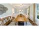 Bright dining room features a large wooden table and seating for six at 8024 Plymouth Dr, Sherrills Ford, NC 28673