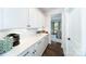 White kitchen with ample counter space and built-in appliances at 8024 Plymouth Dr, Sherrills Ford, NC 28673