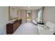 Cozy bedroom with large art piece, dresser, and two comfy armchairs at 8024 Plymouth Dr, Sherrills Ford, NC 28673