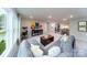 Open concept bonus room featuring a comfortable sitting area and plenty of natural light at 8024 Plymouth Dr, Sherrills Ford, NC 28673