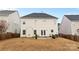 House back exterior view with patio at 1032 Yellow Daisy Dr, Matthews, NC 28104