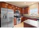 Kitchen with stainless steel appliances and wood cabinets at 1032 Yellow Daisy Dr, Matthews, NC 28104