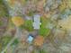 Overhead view showcasing house, detached building, and driveway at 143 Ponokah Ln, Statesville, NC 28677