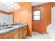 Double vanity bathroom with granite countertop and updated fixtures at 143 Ponokah Ln, Statesville, NC 28677