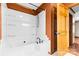 Bathroom boasts a large tub/shower combo and an updated vanity at 143 Ponokah Ln, Statesville, NC 28677