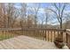 Wooden deck overlooking a wooded landscape at 143 Ponokah Ln, Statesville, NC 28677