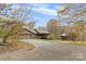 House with long driveway and detached barn at 143 Ponokah Ln, Statesville, NC 28677