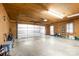 Spacious garage with overhead door and extra storage at 143 Ponokah Ln, Statesville, NC 28677