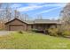 Charming ranch home with attached garage and covered porch at 143 Ponokah Ln, Statesville, NC 28677