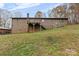 Ranch home with deck, brick foundation and wooded setting at 143 Ponokah Ln, Statesville, NC 28677
