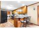Kitchen features granite countertops, wood cabinets, and breakfast bar at 143 Ponokah Ln, Statesville, NC 28677