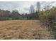 Open land with trees and fence at 143 Ponokah Ln, Statesville, NC 28677