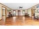 Hardwood floors, high ceilings, and neutral walls in a large living room at 143 Ponokah Ln, Statesville, NC 28677