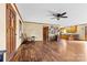 Living room with hardwood floors and views into kitchen area at 143 Ponokah Ln, Statesville, NC 28677
