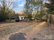 Home with large yard and trees at 1476 New Hope Rd, Heath Springs, SC 29058