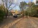 Home situated on a wooded lot at 1476 New Hope Rd, Heath Springs, SC 29058