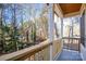 Wooden porch with wooded views, offering a peaceful retreat at 314 Henry Chapel Rd, Belmont, NC 28012