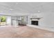 Finished basement with recreation area, fireplace, wet bar, and sliding glass door to backyard at 1532 Starbrook Dr, Charlotte, NC 28210