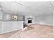 Finished basement with fireplace and wet bar at 1532 Starbrook Dr, Charlotte, NC 28210