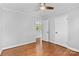 Well-lit bedroom with hardwood floors and ample closet space at 1532 Starbrook Dr, Charlotte, NC 28210