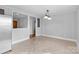Dining area with herringbone floors and neutral walls at 1532 Starbrook Dr, Charlotte, NC 28210