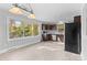 Modern kitchen with dark cabinets and herringbone flooring at 1532 Starbrook Dr, Charlotte, NC 28210
