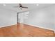 Spacious living area featuring hardwood floors and neutral walls at 1532 Starbrook Dr, Charlotte, NC 28210