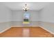 Light-filled dining room featuring hardwood floors at 2216 Lowell Bethesda Rd, Gastonia, NC 28056