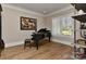 Bright music room with grand piano and hardwood floors at 3708 Piaffe Ave, Mint Hill, NC 28227