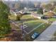 Aerial view of a ranch home with a fenced backyard at 4006 Little Mountain Rd, Gastonia, NC 28056