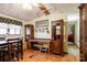 Cozy dining area with wood flooring, built-in cabinets, and a view to another room at 465 Lakedale Dr, Clover, SC 29710