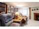 Relaxing living room with fireplace and built-in shelving at 465 Lakedale Dr, Clover, SC 29710