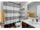 Clean bathroom with a striped shower curtain and modern vanity at 537 Stockton Way, Rock Hill, SC 29732