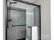 Large walk-in shower with gray tile and glass enclosure at 537 Stockton Way, Rock Hill, SC 29732