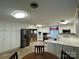 Spacious kitchen featuring white cabinetry and stainless steel appliances at 6650 Sherrills Ford Rd, Salisbury, NC 28147