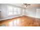 Living room with hardwood floors, fireplace and lots of natural light at 1032 Old Charlotte Rd, Concord, NC 28027