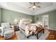 Spacious main bedroom with sitting area and access to bathroom at 12202 Shiro Ct, Huntersville, NC 28078