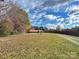 Property view showing home, yard, and surrounding landscape at 133 Elmwood Rd, Statesville, NC 28625