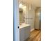 Updated bathroom with gray vanity and stylish tile backsplash at 133 Elmwood Rd, Statesville, NC 28625