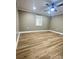 Spacious bedroom with ceiling fan and large window at 133 Elmwood Rd, Statesville, NC 28625