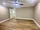 Spacious bedroom with ceiling fan and wood-look flooring at 133 Elmwood Rd, Statesville, NC 28625