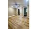 Well-lit bedroom with ceiling fan and wood-look floors at 133 Elmwood Rd, Statesville, NC 28625