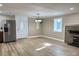 Basement dining area with LVP flooring and white door at 133 Elmwood Rd, Statesville, NC 28625