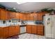 Well-equipped kitchen with wood cabinets, stainless steel dishwasher, and microwave at 1335 Huckleberry Dr, Lincolnton, NC 28092
