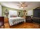 Main bedroom with hardwood floors and a ceiling fan at 1335 Huckleberry Dr, Lincolnton, NC 28092