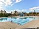 Community pool with lap lanes, waterslide and lounge area at 17422 Hawkwatch Ln, Charlotte, NC 28278