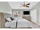 Main bedroom with large window and ceiling fan at 1920 Billingsville School Ct, Charlotte, NC 28214