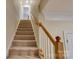 Carpeted staircase leading to the upper level at 4335 Laurel Hill Ln, Charlotte, NC 28217