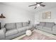 Relaxing bedroom with gray sofas and decorative rug at 7019 Branch Fork Rd, Charlotte, NC 28215