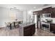 Eat-in kitchen featuring an island and stainless steel appliances at 7019 Branch Fork Rd, Charlotte, NC 28215